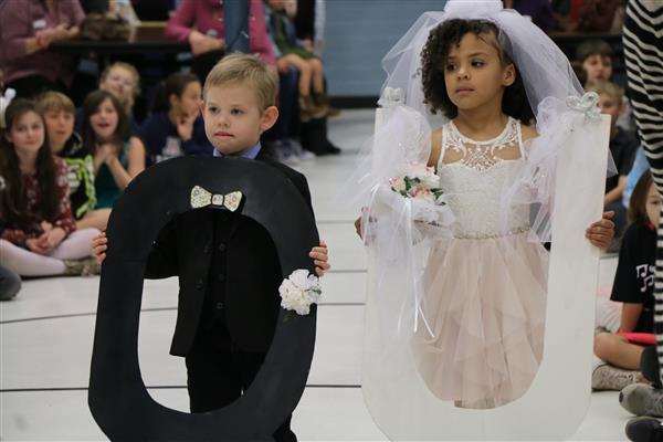  Mesa Verde kindergartners dress up as the letter "Q" and "U"
